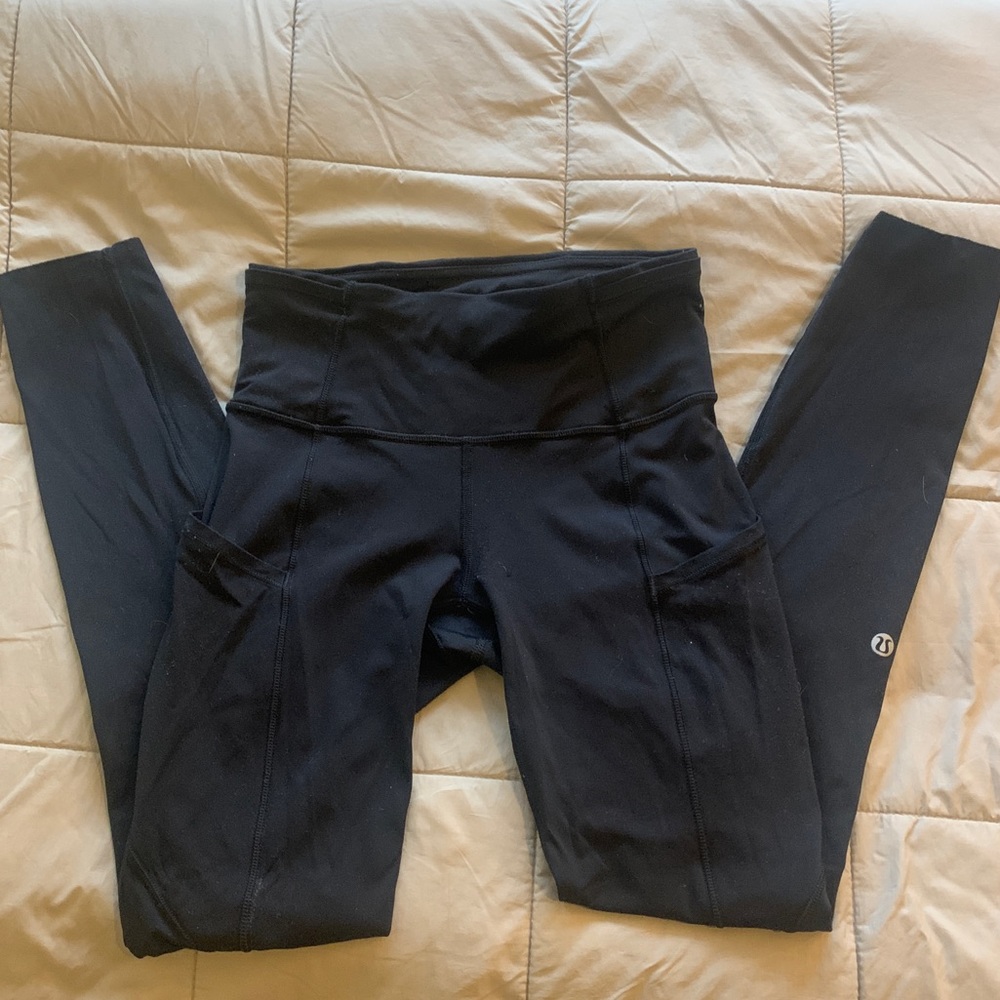 Lululemon leggings - quick dry athletic material, pockets, draw string, raw hem